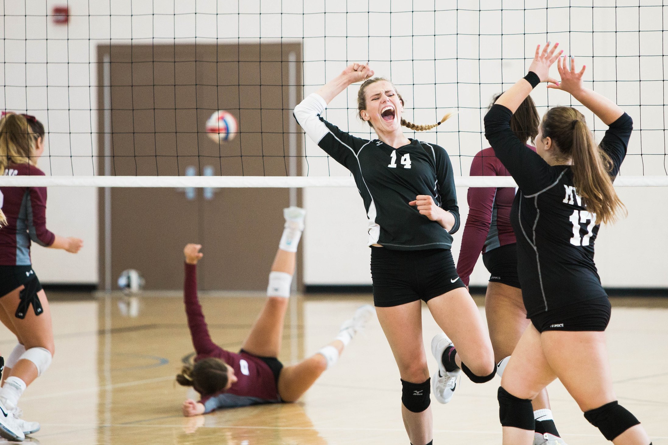 young women playing volleyball - Sportingmindsuk